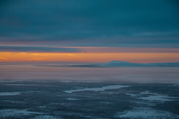 Ski slopes of Ylläs in the background at sunset. Levi Lapland, Finalnd