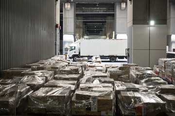 Warehouse Logistic - Truck and cargo at industrial warehouse