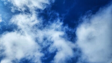 Blue sky background with white clouds. Sky background with white clouds.