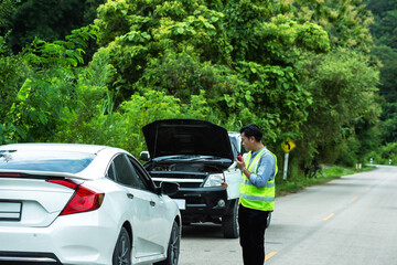Car insurance agent man calling police about accident on urban road