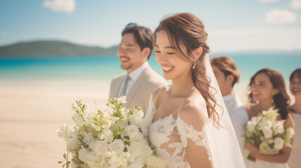 bride and groom are smiling and posing for a picture on a beach