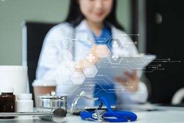 Doctor using clipboard and digital tablet find information patient medical history at the hospital. Medical technology concept.