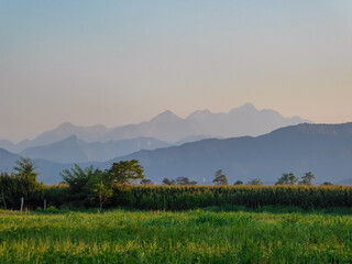 Panoramic view of beautiful mountain range in summer seen from the village of Busca, Cuneo...