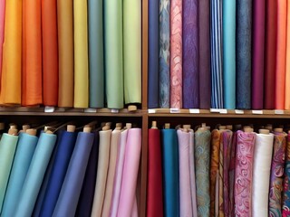 Fabric shop display - different types of fabric, colors and textures, bright colors.
