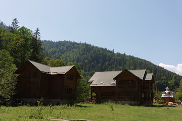 Beautiful sunrise in mountains with white fog below panorama