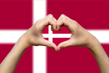 Denmark flag with two hands heart shape, vector design, support or donate to Denmark, express love 
