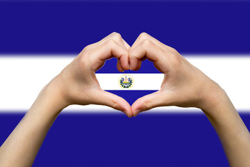 El Salvador flag with two hands heart shape, hand heart love sign, patriotism and nationalism idea