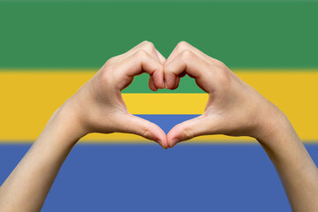 Gabon flag with two hands heart shape, support or donate to Gabon, hand heart love sign, express 