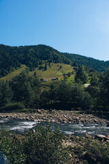 Beautiful sunrise in mountains with white fog below panorama