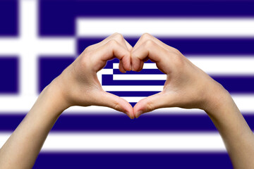 Greece flag with two hands heart shape, express love or affection concept, hand heart love sign