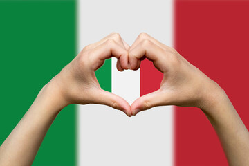Italy flag with two hands heart shape, express love or affection concept, support or donate to 