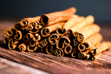 Close-up pile of cinnamon sticks.