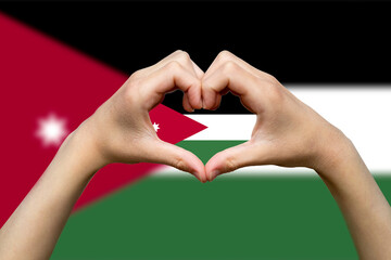 Jordan flag with two hands heart shape, vector design, express love or affection concept, support 