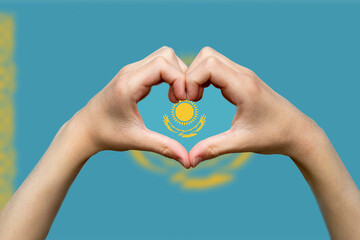 Kazakhstan flag with two hands heart shape, patriotism and nationalism idea, vector design, hand 