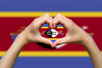 Swaziland flag with two hands heart shape, hand heart love sign, express love or affection concept