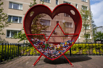 Warsaw, Poland - April 25th 2024: Place for collecting colorful plastic bottle caps for recycling...