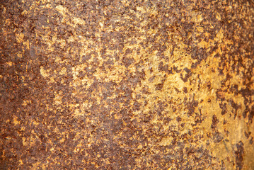 Gold texture design element blurred background glittering. Golden pattern backdrop decoration with copy space. Magic yellow orange shiny glowing selective focus. Glamour effect gold antique defocused