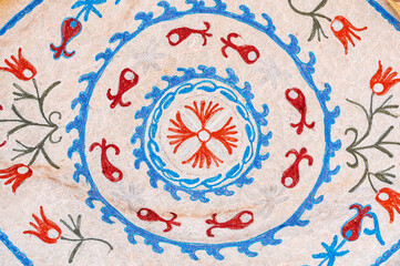 Old vintage white rug with traditional Arabic Uzbek pattern in Uzbekistan close up