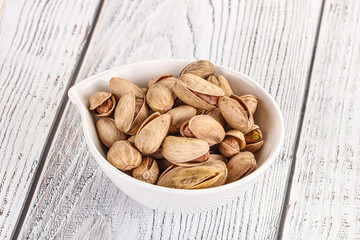 Salted tasty pistachio nuts heap