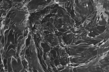 Dark deep black water surface with ripples	