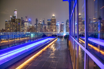 Midtown Manhattan at night. Panoramic aerial view of New York City skyscrapers