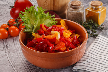 Diced raw bell red and yellow pepper