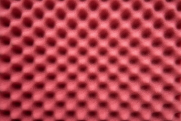 Pink acoustic foam panel wall,  front view