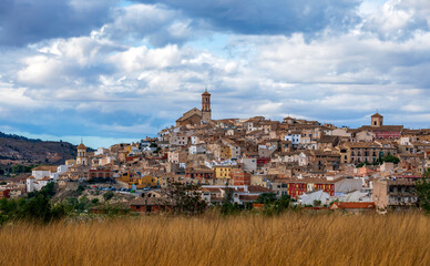Panoramic view of the old quarter of Cehegín, Region of Murcia, with the Maria Magdalena parish tower above - obrazy, fototapety, plakaty