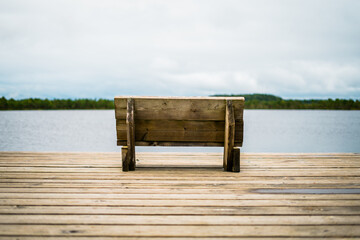 bench with a view of the lake in estonia lahemaa national park