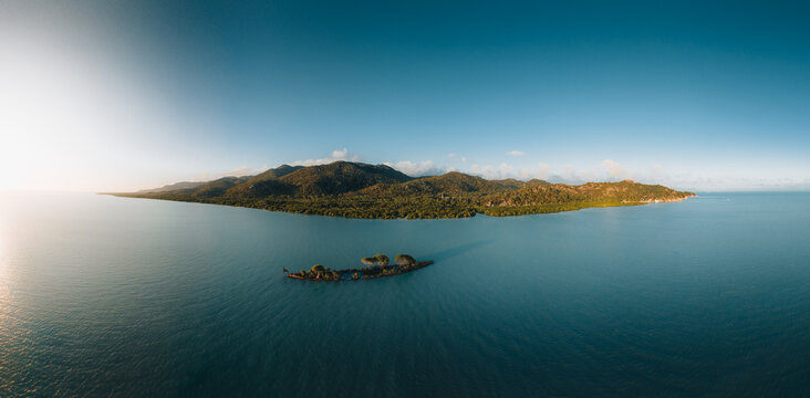 Drone Aerial Image of the S.S City of Adelaide shipwreck on Cockle Bay Magnetic Island in Townsville, Queensland, Australia. Beautiful ocean colors during sunset.