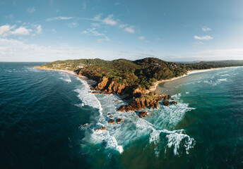 Byron Bay lighthouse and the pass high on the rocky headland - the most eastern point of Australian...