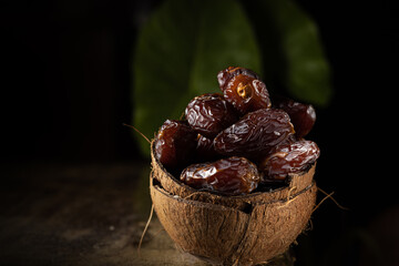 dates inside a coconut shell