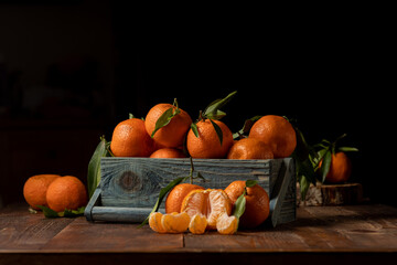 tangerines in a blue box