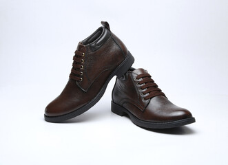 dark brown leather boots isolated on white background