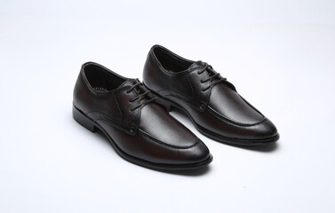dark brown party wear formal shoes isolated on white background
