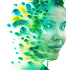 A woman's portrait merged with green and yellow watercolor in paintography