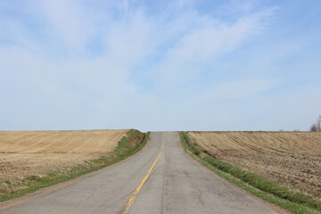 Uphill on country road in spring