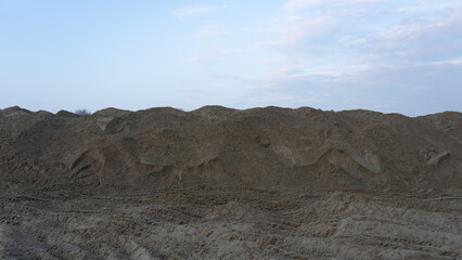 A wall of sand on the beach
