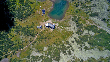 Mountain lakes from a drone aerial photography. The highest peak Musala in the Balkans in Bulgaria, height 2925 meters. Mountain lakes, mountain huts and the spirit of travel