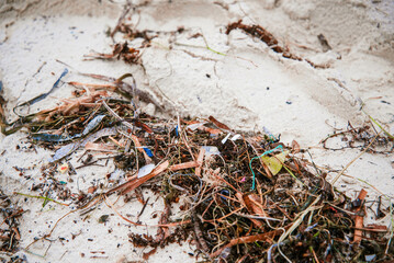 rubbish and microplastic washed up on beach, rottnest island, western australia