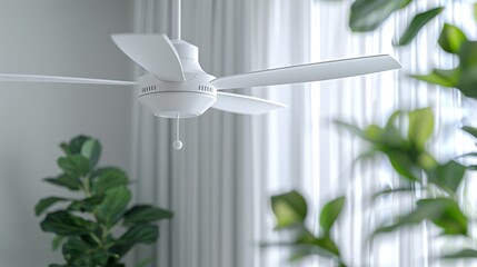 Modern ceiling fan with integrated lamp in a fresh indoor setting with green plants
