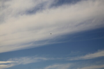 airplane flying over the clouds