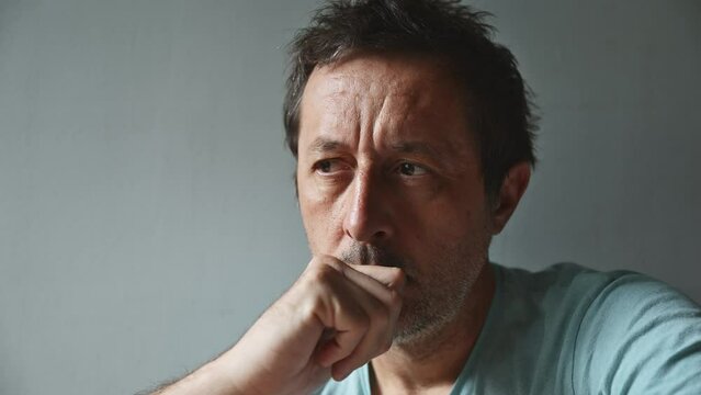 Portrait of solemn pensive mature adult caucasian man