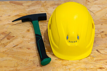 a construction helmet with hammer