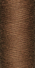 macro texture of a skein of brown sewing thread