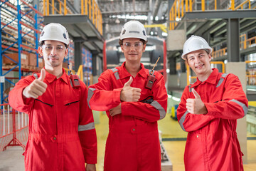 Industrial Team Greeting Each Other in Manufacturing Plant
