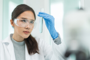 Scientist doing chemical test in research lab to study vaccine