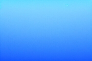 Fototapeta premium Fondo azul vacío y foco con estudio para mostrar o diseñar. Fondo en blanco hecho de material de cemento.