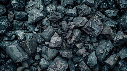 Dark gray rocks on the ground, top view