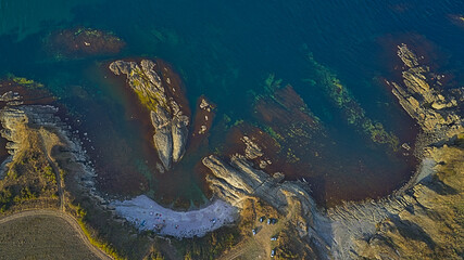 A panoramic view of the sea and rocky coves on the coast of the Black Sea in Bulgaria. This aerial photograph captures the stunning beauty of the coves and the sea.